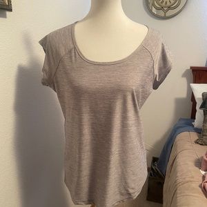 Cute woman’s fitness top